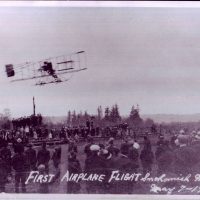 First Plane take off at Skydive Snohomish with large crowd standing by to watch.