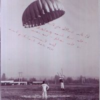 Skydiver almost touching the ground while skydiving at Harvey Field.