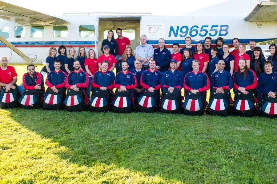 skydive snohomish team lined up neatly in front of aircraft